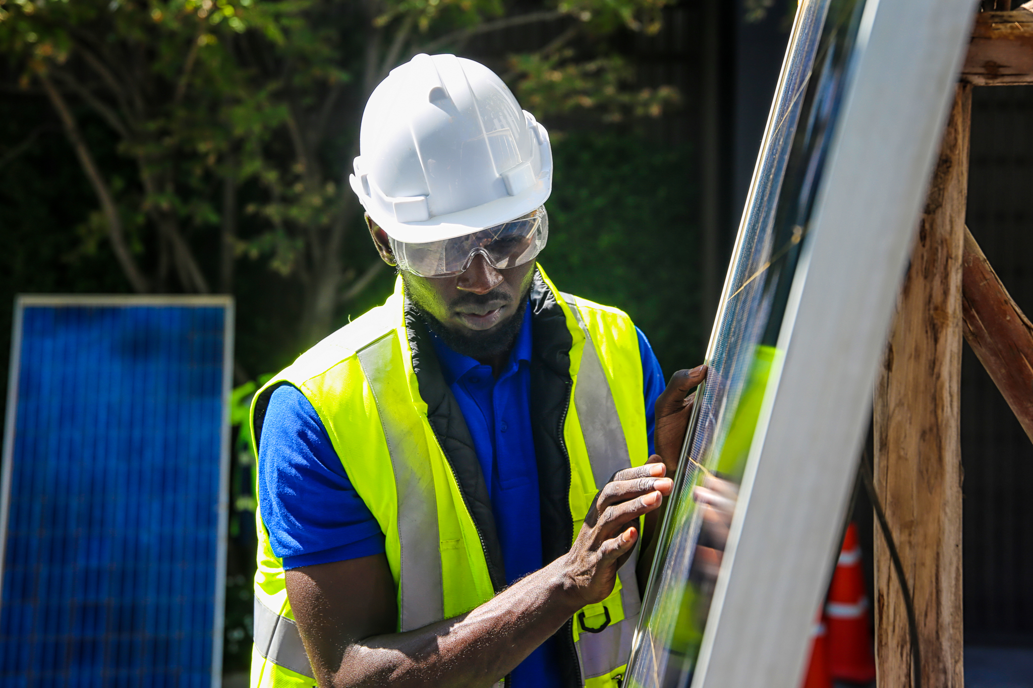 Technicians maintenance solar panel and checking cell working with tablet for home alternative renew